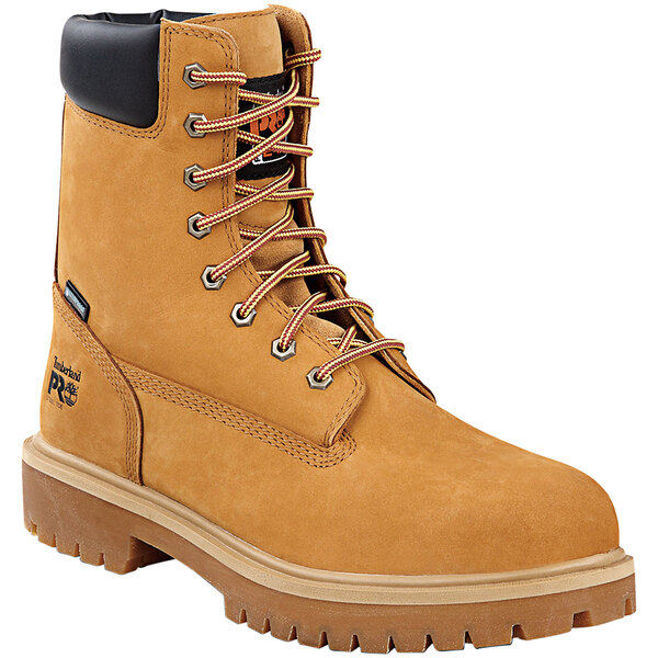 A pair of brown Timberland Pro leather work boots with laces.