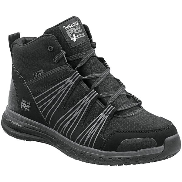 A black Timberland Pro hiker boot with grey accents.