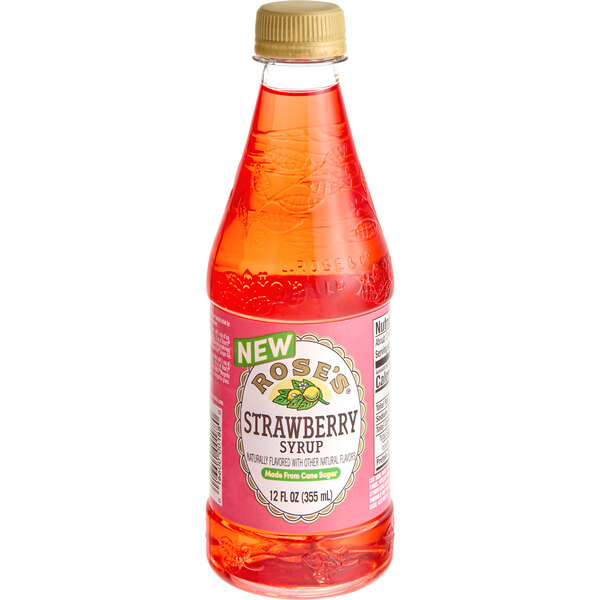 A close up of a bottle of Rose's Strawberry Syrup with a white label.