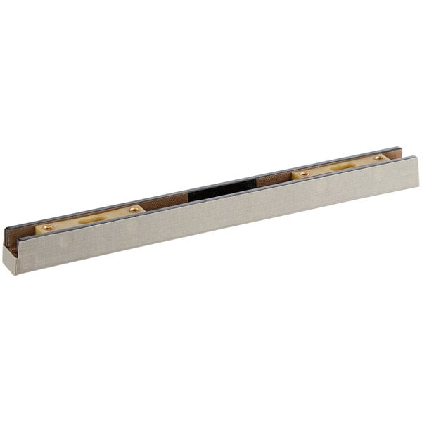 A metal seal bar with a black strip on a rectangular box with a black and white frame.
