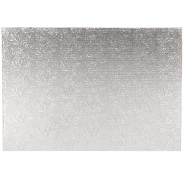 A white and silver Enjay full sheet silver cake board with a patterned silver surface.