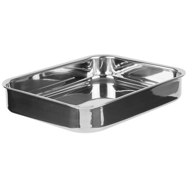 A Vollrath stainless steel rectangular roasting pan on a counter.