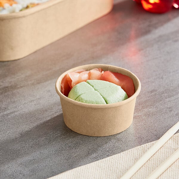 A Choice round Kraft bowl filled with sushi on a table.