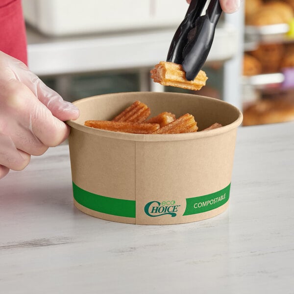 A round kraft compostable take-out container filled with churros, labeled 'EcoChoice' and 'Compostable.'