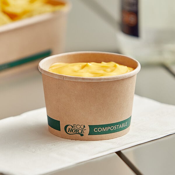 A Kraft EcoChoice take-out container of food on a napkin.