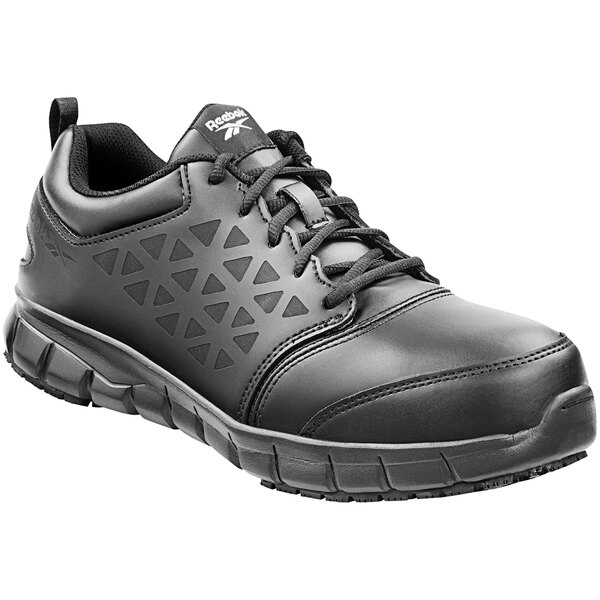 A pair of Reebok Work Sublite black non-slip athletic shoes for men with a lace-up design.