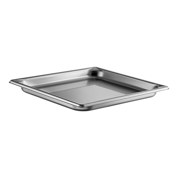 A Vollrath stainless steel 2/3 size steam table pan on a counter.