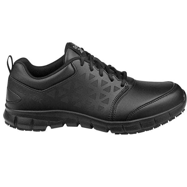 A pair of black Reebok Work Sublite athletic shoes.