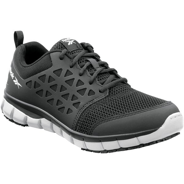 A black Reebok Work Sublite athletic shoe with white accents.