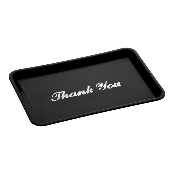 A rectangular black tip tray with the words 'Thank You' printed in white in the center.