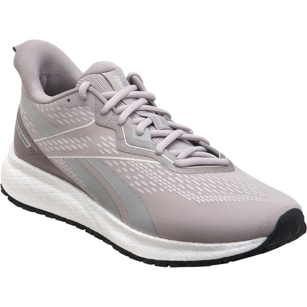A close up of a Reebok gray and white non-slip athletic shoe.