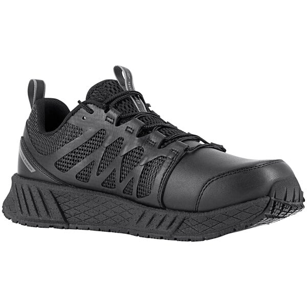 A Reebok black men's work shoe with laces.