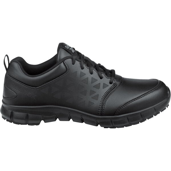 A Reebok black athletic shoe with a white background.