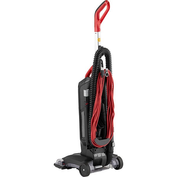 A black and red Hoover Task Vac 2 commercial bagged upright vacuum cleaner with red accents.