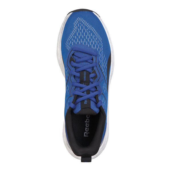 A blue and white Reebok women's athletic shoe with a soft toe and non-slip sole, shown from a top view.