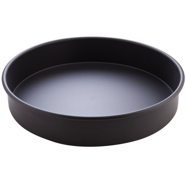 An American Metalcraft hard coat anodized aluminum round cake pan with straight sides.