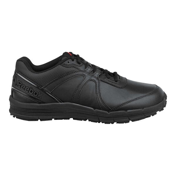 A black Reebok men's athletic shoe with a soft toe, non-slip sole, and wide width design.