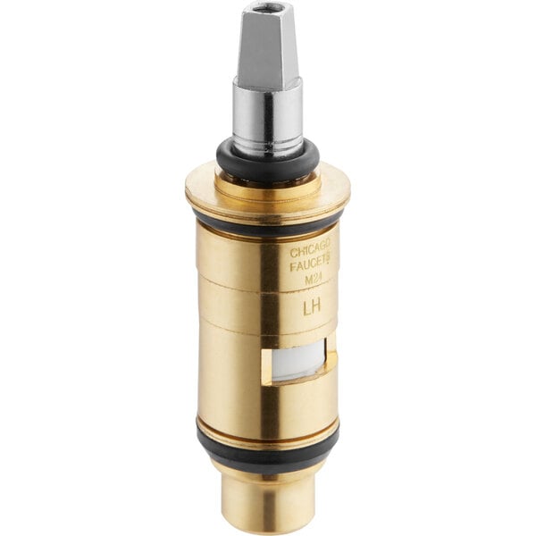 A gold and silver Chicago Faucets left hand ceramic water valve cartridge.