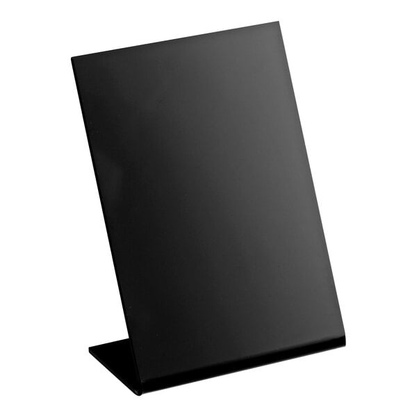 A black tabletop chalkboard sign with a slanted design for display.