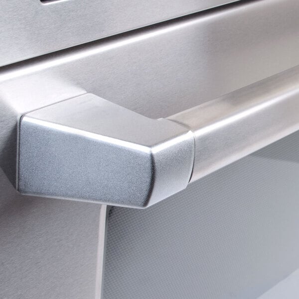 The stainless steel door of a Panasonic Sonic Steamer commercial microwave oven.