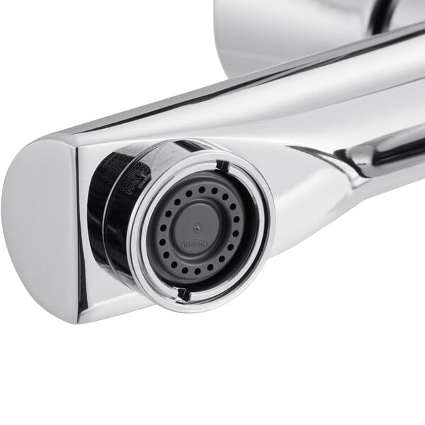 A close-up of a Chicago Faucets deck-mounted metering sink faucet with a chrome finish.