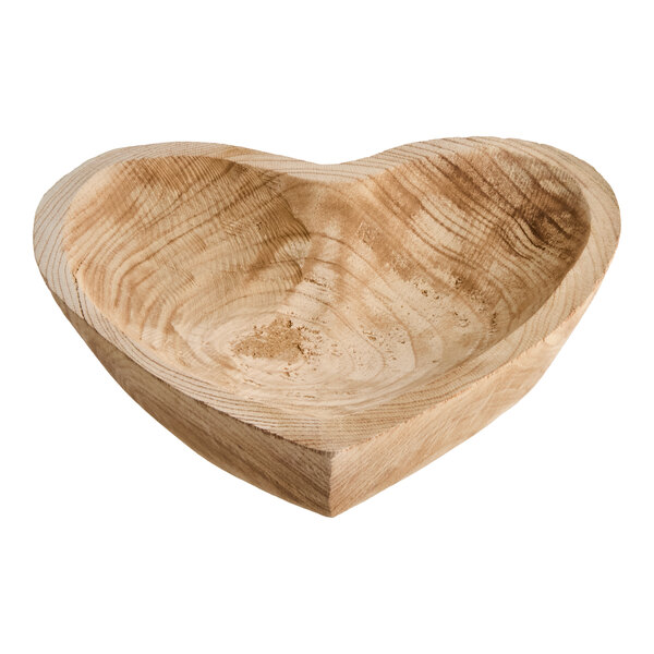 A heart-shaped carved wooden display bowl.