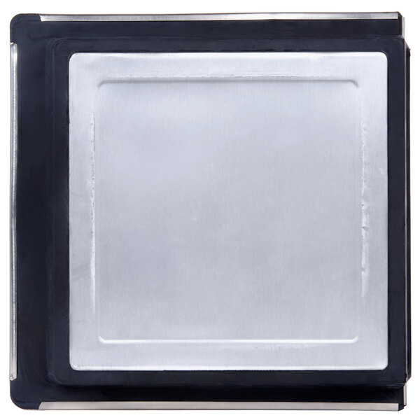 A stainless steel lid for an Assure commercial ice cream freezer.