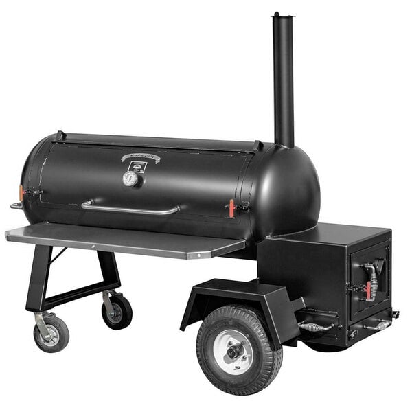 A black Meadow Creek TS120P barbecue smoker on wheels.