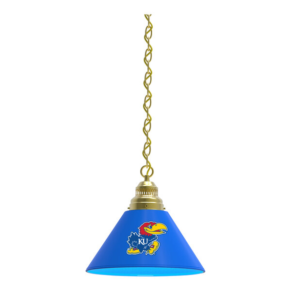 A blue lamp shade with the University of Kansas logo in brass.
