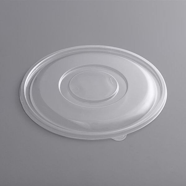 A Visions clear plastic lid with a round top.