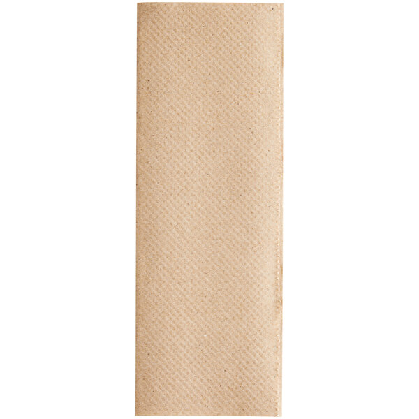 A close-up of a brown Tork multi-fold paper towel.