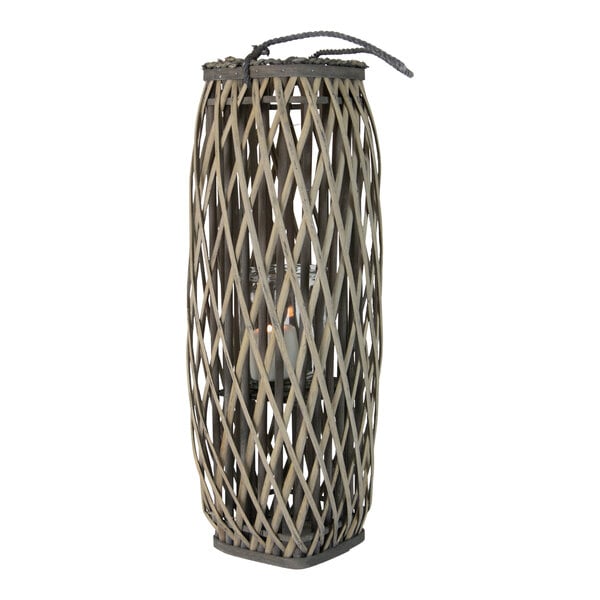 A Kalalou tall gray wicker lantern with a candle inside.