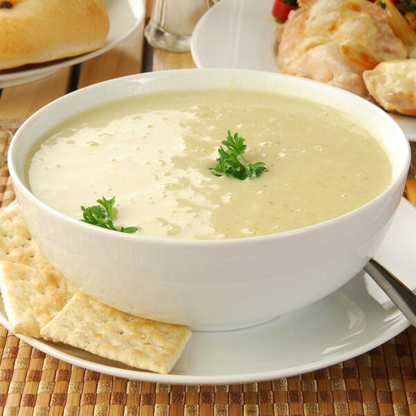 A bowl of Chef's Companion cream soup with crackers on the side.