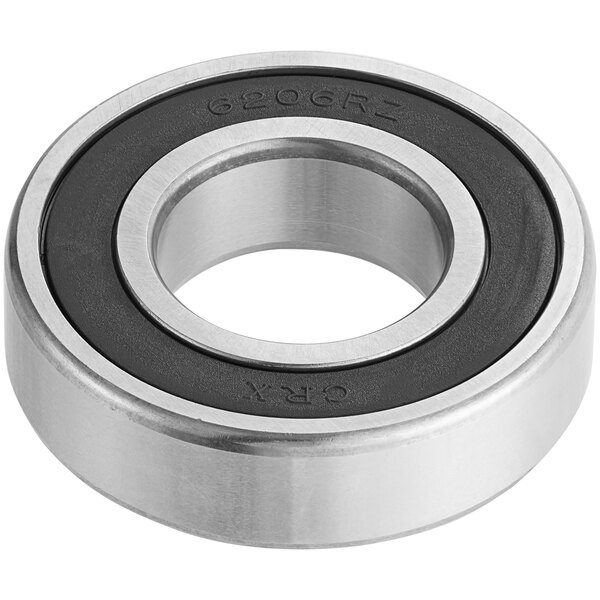 A close-up of an Estella bearing with a black and white ring.