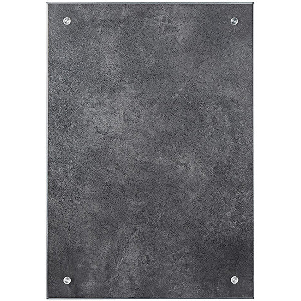 A reversible black and gray rectangular tile with screws.