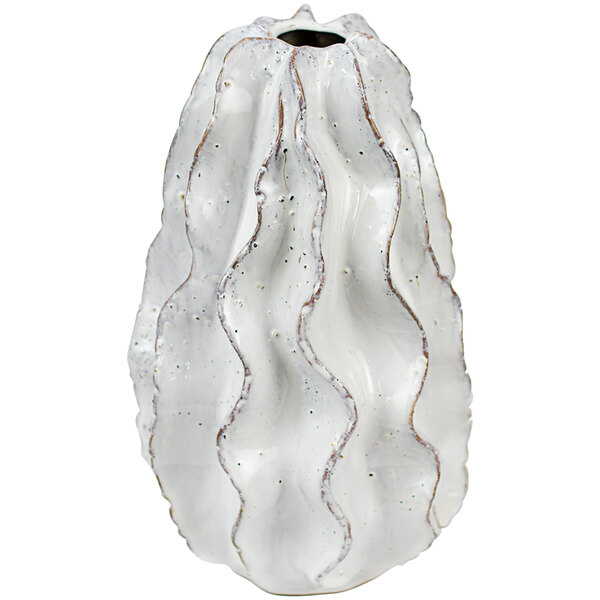 A white ceramic vase with a ruffled design.