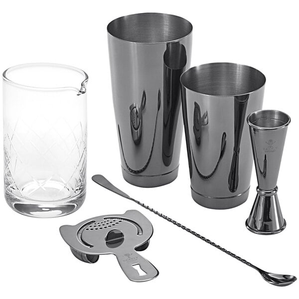 A Barfly black and silver cocktail mixing kit on a counter.