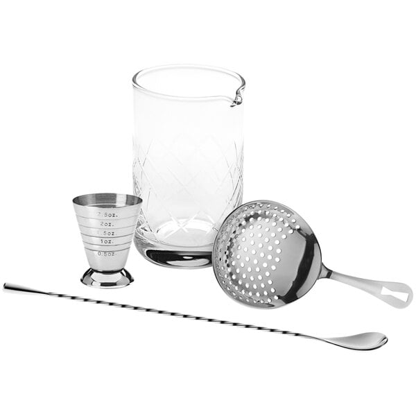 A Barfly stainless steel cocktail mixing kit with a strainer and a glass.