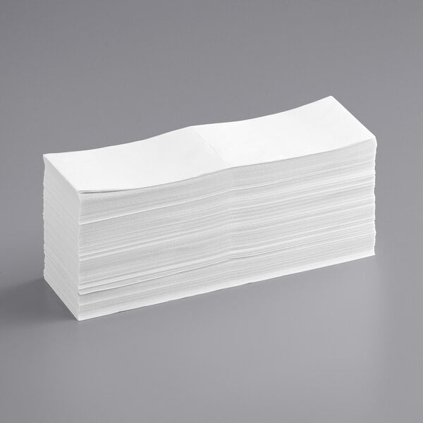 A stack of Lavex white thermal transfer fanfold labels.