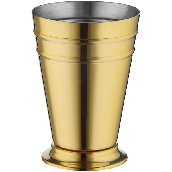 A gold cup with a silver rim.