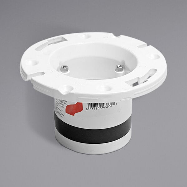 A white round Oatey PVC water closet flange with a black stripe.