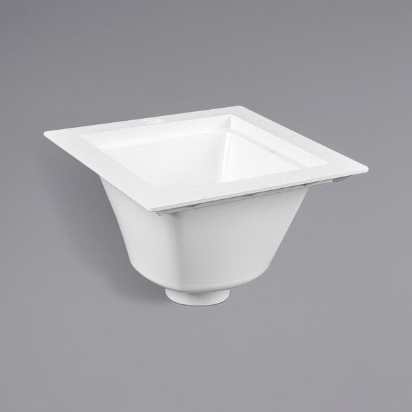 A white square Oatey PVC floor sink.