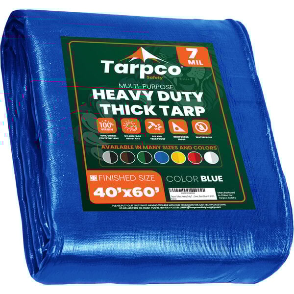 A blue Tarpco heavy-duty weatherproof tarp with green and white label.