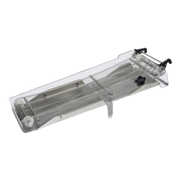 A metal and plastic device with a grid-like surface, adjustable knobs, and a transparent cover, likely used for food processing or handling.