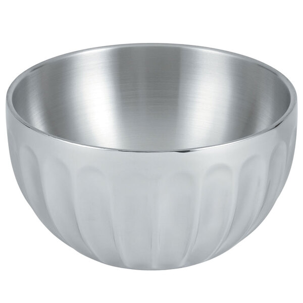 A silver stainless steel Vollrath serving bowl with a curved design.