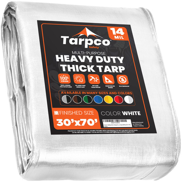 A white Tarpco poly tarp with black and red text that reads "Safety Extra Heavy-Duty"