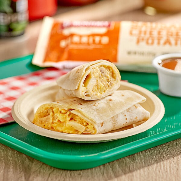 An El Monterey breakfast burrito with egg, sausage, potato, and cheese on a plate.