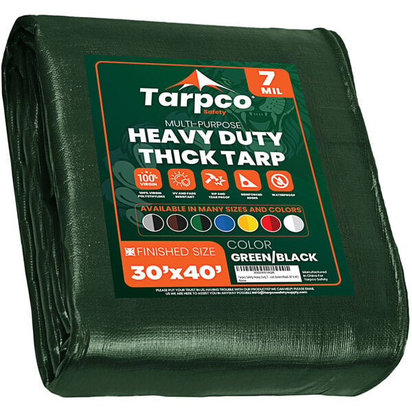 A green heavy-duty Tarpco poly tarp with reinforced edges.