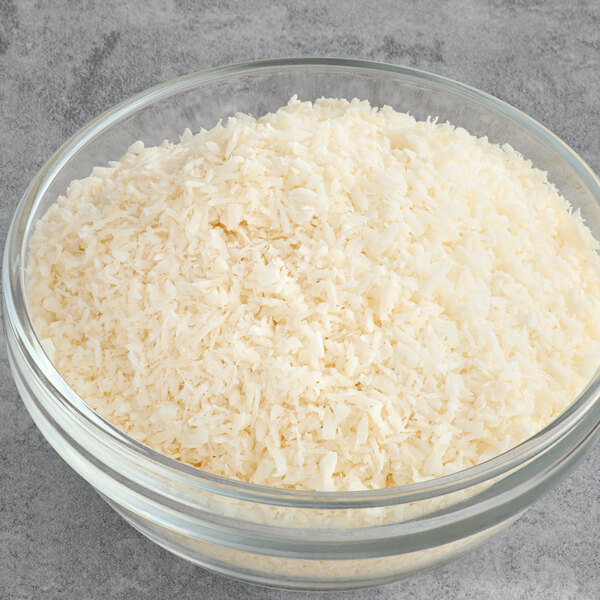 A bowl of Bob's Red Mill Unsweetened Shredded Coconut.