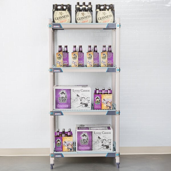 A MetroMax i open grid shelf with boxes and bottles on it.